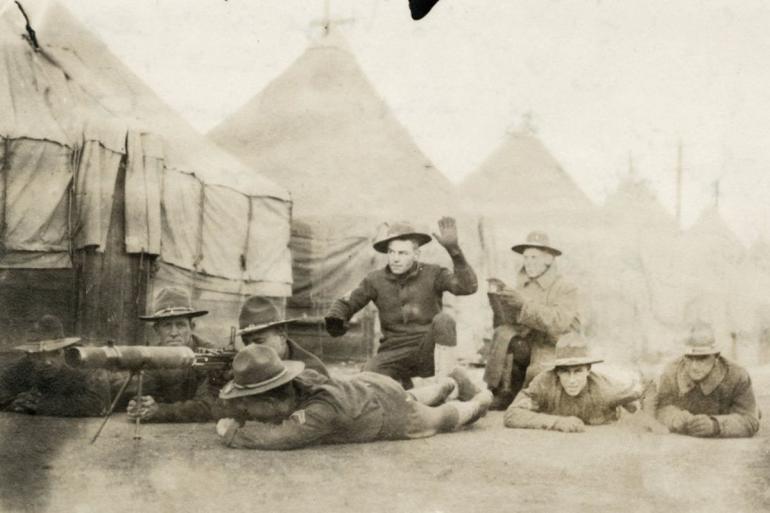 American soldiers drilling with an early machine gun